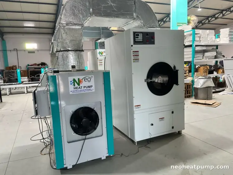 Neo heat pump paired with a commercial tumble dryer on the assembly floor