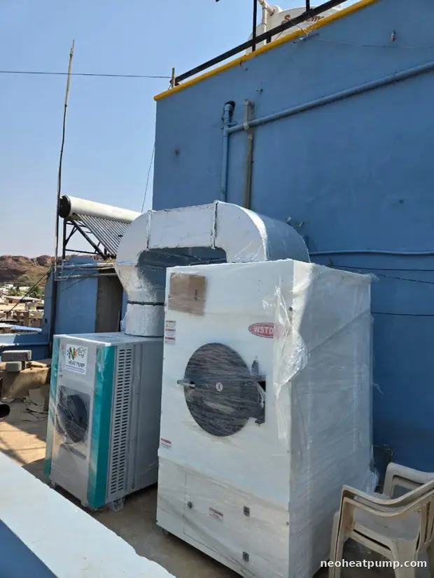 Rooftop installation &mdash; Neo heat pump feeding a commercial dryer